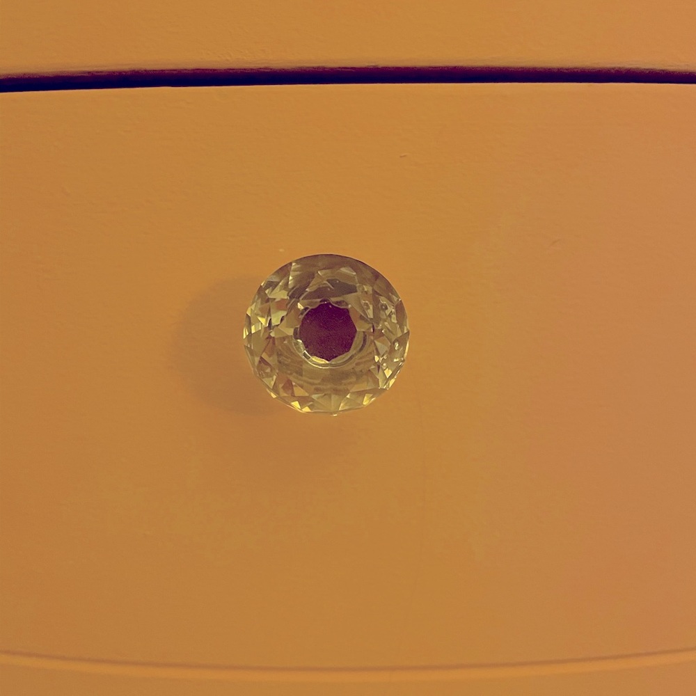 Set of 24 glass knobs for cabinets or drawers. Will come with hardware.